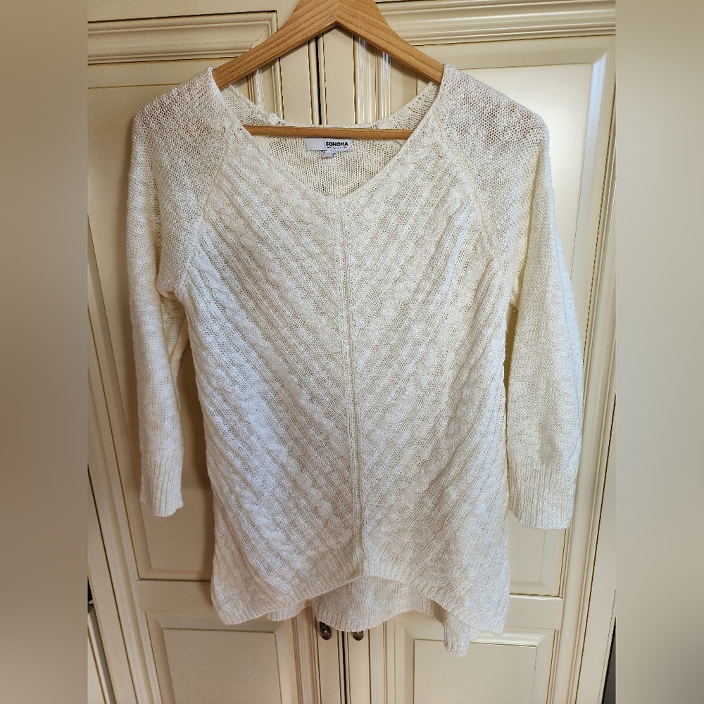 Off white sweater, Size Small; excellent condition.